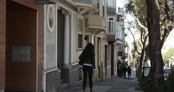 Woman walking in a city street