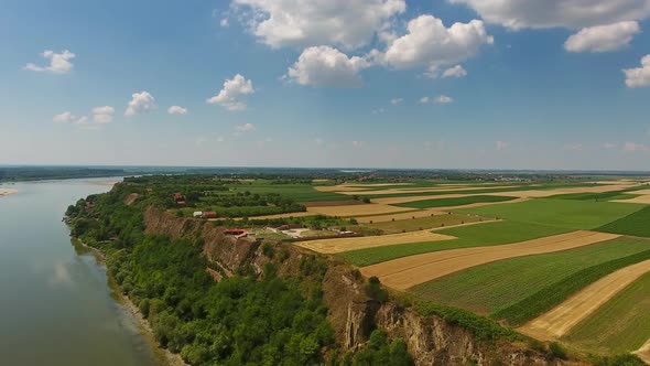 Aerial View of Colorful Fields on Bank of Danube