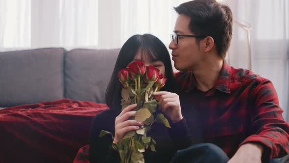 Happy Asian Couple Spending Valentines Day Indoors