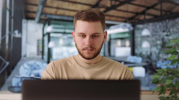 Male Working in Modern Office