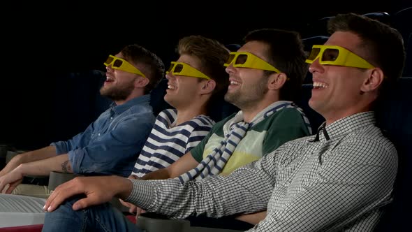 Young Friends Watching a Film at the Cinema. Close Up, 3D Glasses, Side View