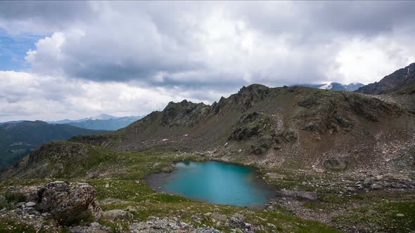 Mountain Lake With Blue Water In Rock Top 4