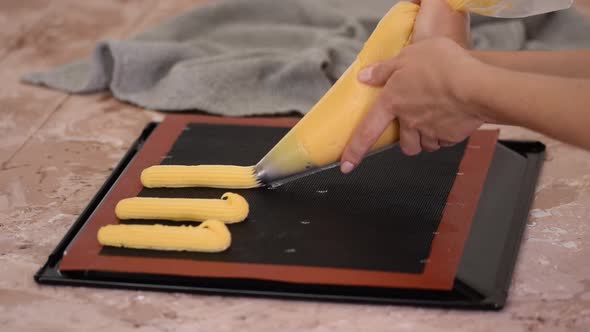 Preparation of eclairs in the home kitchen. The process of cooking eclairs.