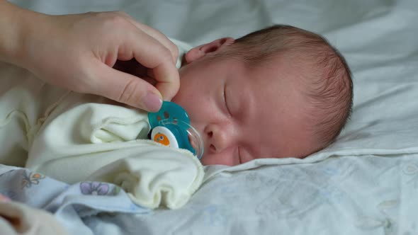 Pacifier Taken From Newborn Baby