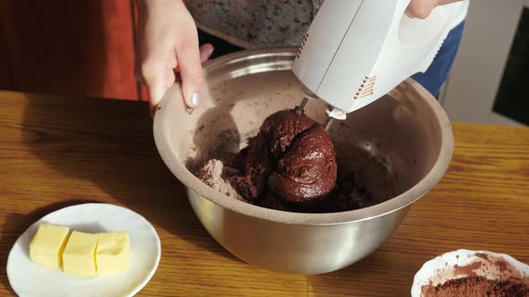 Mixing the cake ingredients until incorporated