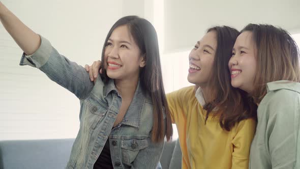 Group of friend enjoy funny moment while lying on the sofa when relax at home.