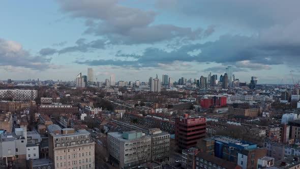 Slider drone shot of London skyscrapers from Camden