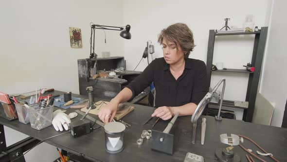 Small Business Jeweler Working in Studio