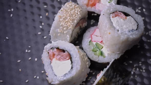 Fresh Sushi Roll With Sesame Seeds Rotate Close Up