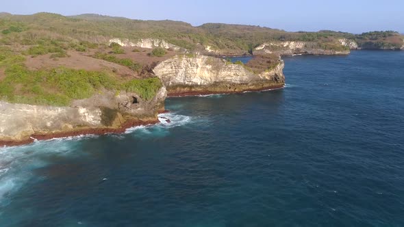 Aerial view of cliff formation on the coast of Bali island, Indonesia.