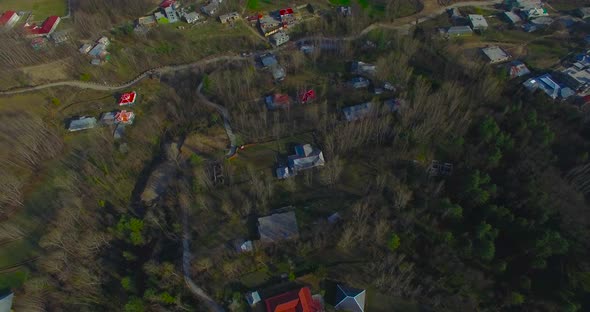 A aerial view of a town in hills.