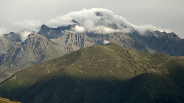 Clouds Passing Over Magnificent Sumptuous Rocky Mountain Summit