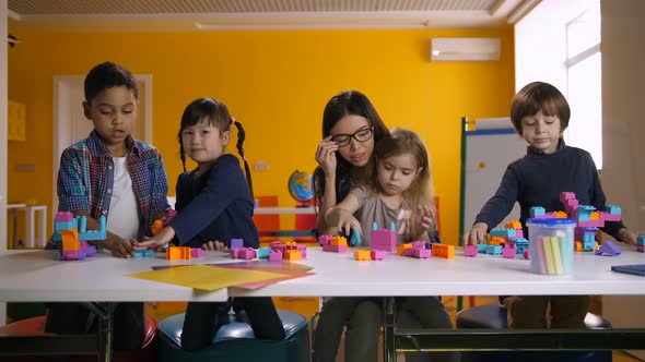 Diverse Kids Playing with Developmental Toys