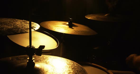 Drummer playing drum in studio