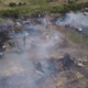 Working Firefighters on Smouldering Ruins in Village, Aerial View - VideoHive Item for Sale