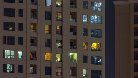 Night View of Exterior Apartment Colorful Buildings Timelapse with Windows
