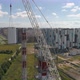 Chimney Pipe Construction, the Crane Lifts the Pipe Segment, Aerial Shot - VideoHive Item for Sale