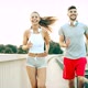 Attractive Man and Beautiful Woman Jogging Together - VideoHive Item for Sale