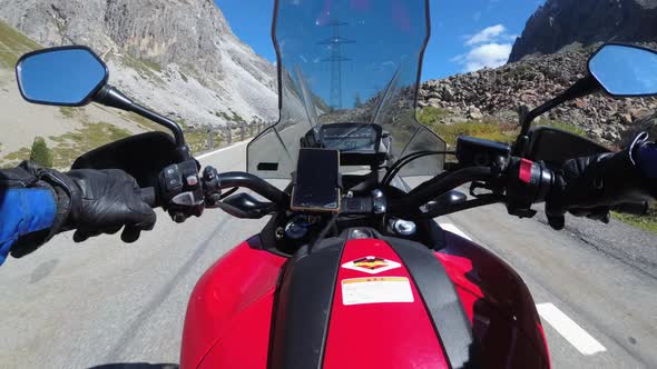 POV Biker Rides on Motorbike By Scenic Mountain Pass in Swiss Alps Moto Trip