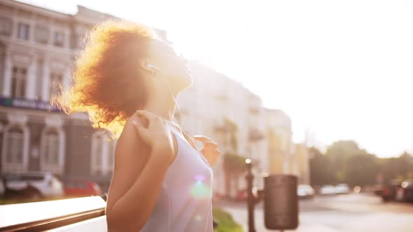 Beautiful Redhead Girl Enjoying Relaxing Sitting on Bench Outside Slow Motion