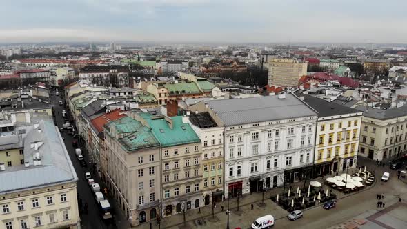 Aerial footage of the a typical street in Krakow Poland showing Renaissance style building