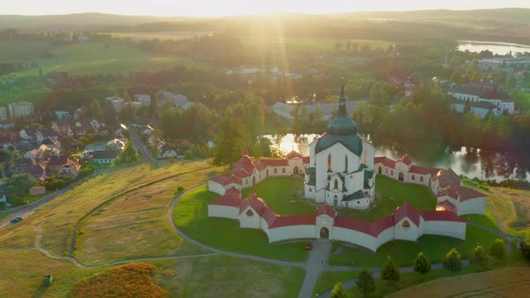 Flying Above the Pilgrimage Church of Saint John of Nepomuk on the Green Hill at Sunset