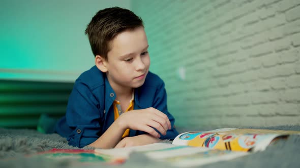 Young boy studying from home during Covid-19