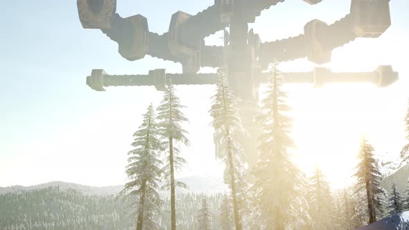 UFO Hovering Over a Forest at Sunset with Light Beam alt