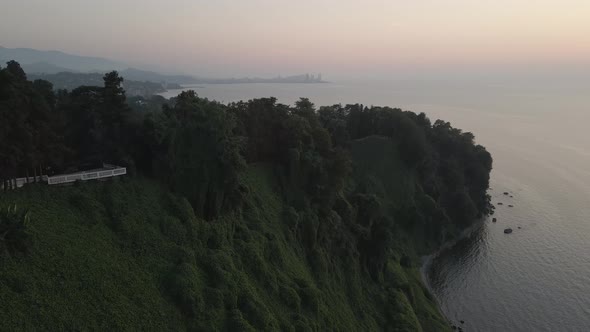 Aerial view of Green cape and Botanical garden of Batumi at sunset. Georgia 2021
