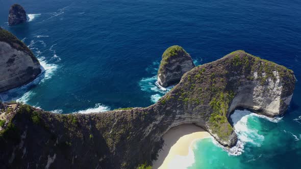 Aerial seascape of nusa penida island in Indonesia, orbital shot of hilly ballinese landscape, sceni