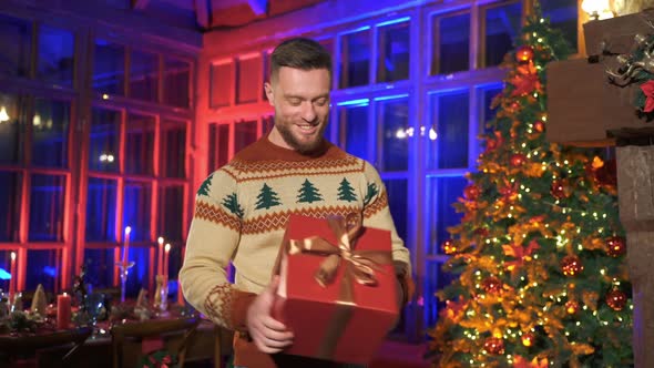 Romantic couple with a gift. 