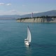 Circling Aerial Shot of Sailboat Cruising the Sea - VideoHive Item for Sale