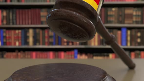 Flag of Gemany on Falling Judges Gavel in Court alt