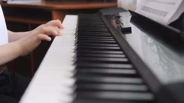 Electronic Piano. Fingers Press the Piano Keys. Music Lesson. Fingers Press the Keys of a Musical