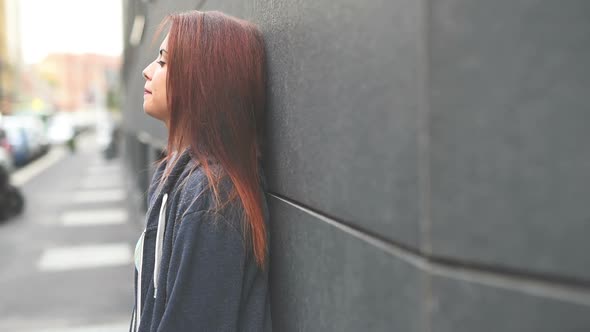 Young multiethnic woman using smartphone