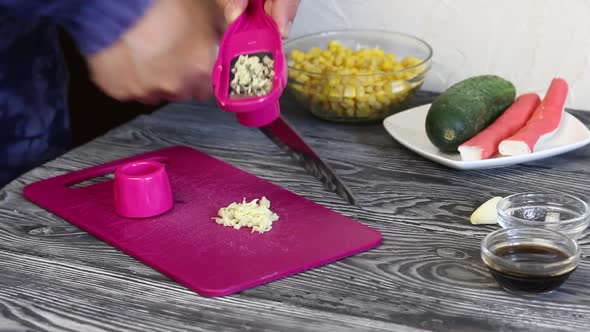 The Man Grinds The Chives On A Grater.