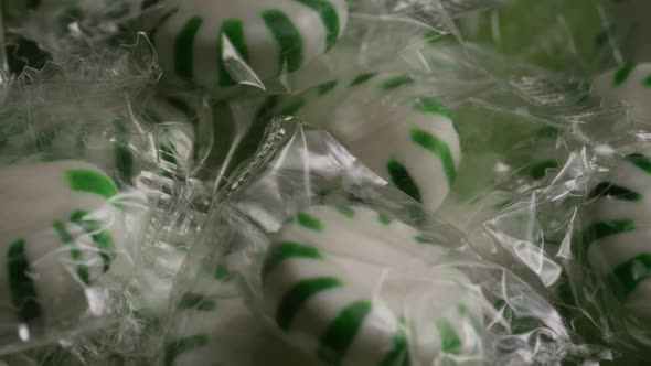 Rotating shot of spearmint hard candies - CANDY SPEARMINT 012