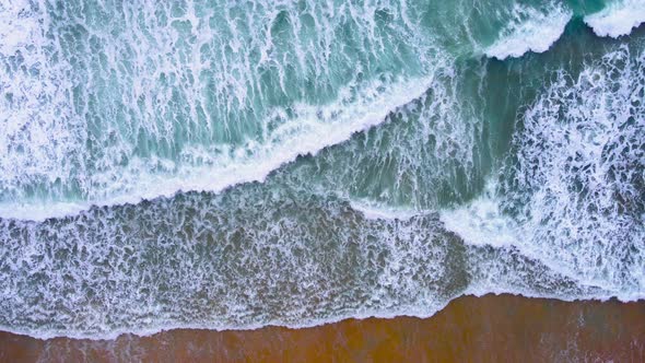 Nature video 4K Aerial view of drone. Scene of top view beach and seawater on sandy beach in summer.