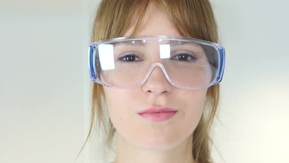 Female Doctor in Protective Glasses