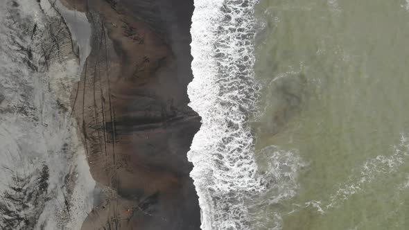 Dark Volcano Sand Beach in Bali, Indonesia