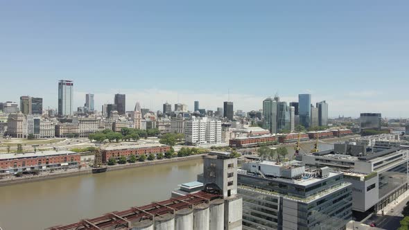 Downtown Buenos Aires Argentine modern harbour waterfront city landscape aerial push in view