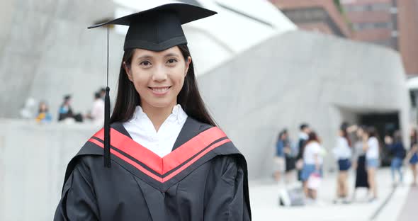 Confident woman get graduated in university