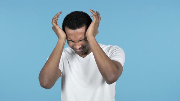 Young African Man with Headache