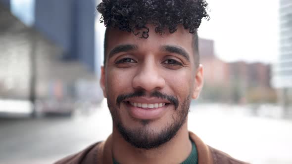 Latin Young Man Smiling on Camera Outdoor  Authentic Real People Lifestyle