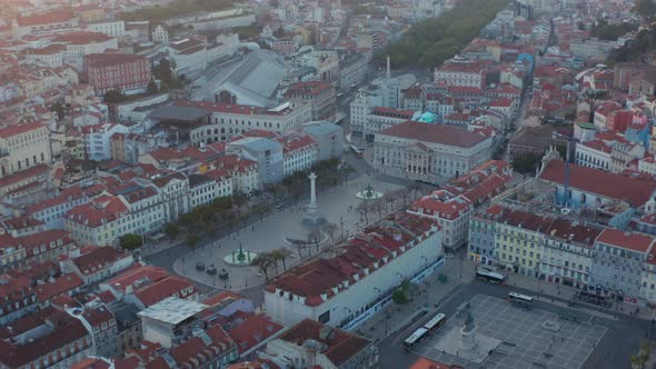 Aerial Rotating View of Column of Pedro IV in Small Public Square in Downtown City Center Lisbon