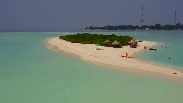 Aerial drone panorama of coastline beach journey by water with sand background