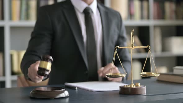 Close Up Shoot of Lawyer Hand Bang the Gavel in Court Room