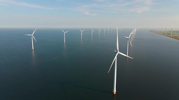 Wind Turbine From Aerial View Drone View at Windpark Westermeerdijk a Windmill Farm in the Lake