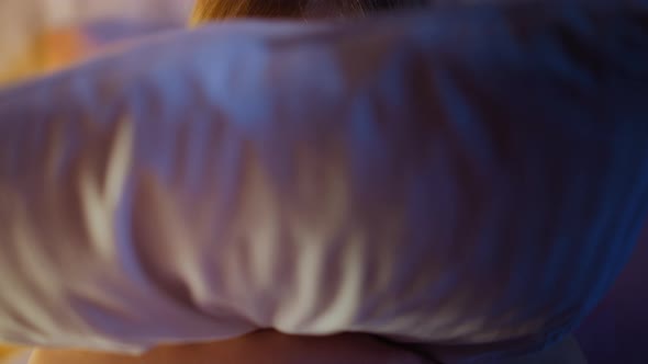 Pretty Girl Hides Behind Pillow Spending Time in Bedroom