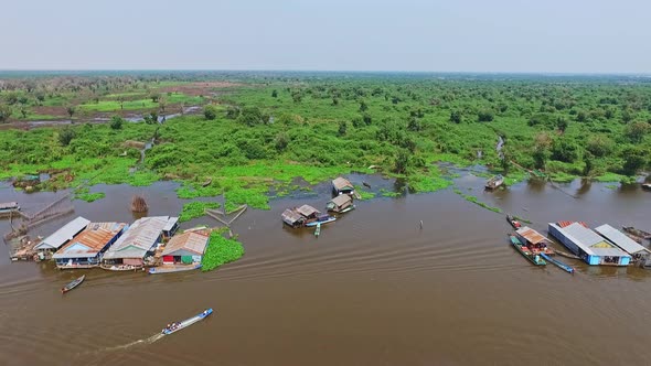 Amazing View Of Kompong Kleang River Village From Houses in Stilts To Aquatic Plants - aerial view